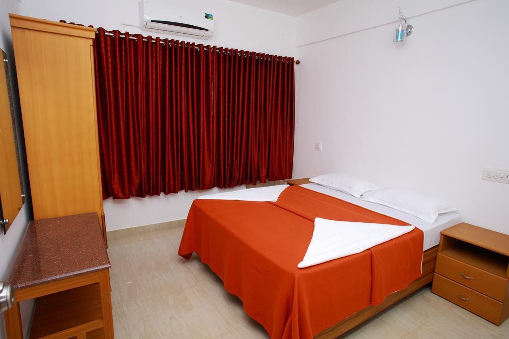 Hotel Phils' Residency & Banquets Kochi Pokoj fotografie