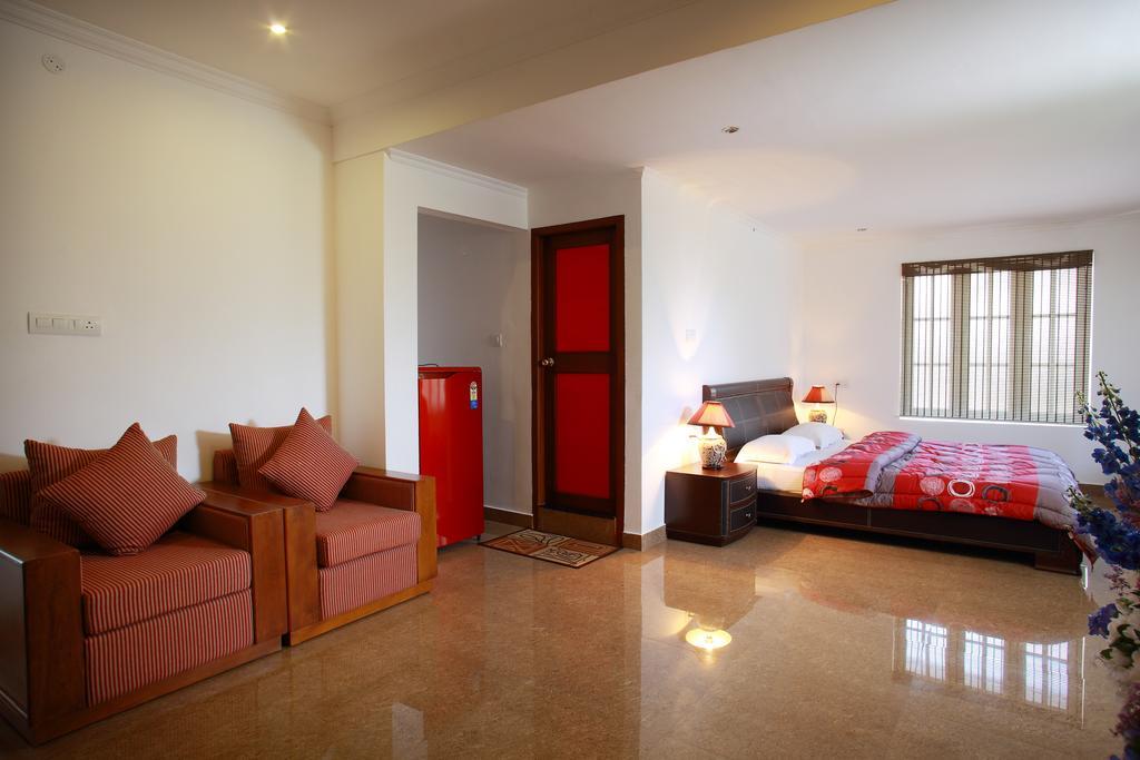 Hotel Phils' Residency & Banquets Kochi Pokoj fotografie